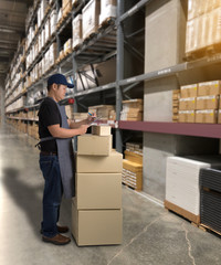 Worker in Mechanic Jumpsuit with holding parcel boxes