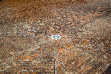 Wall Mural - Old pavement of red bricks