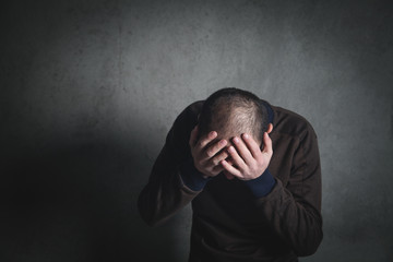 Wall Mural - Caucasian desperate man. Stress, sad, lonely, depression