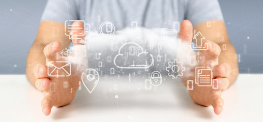 Businessman holding a Cloud of multimedia icon 3d rendering