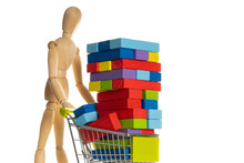 Wooden Manniquine With Shopping Cart And Multicolored Wooden Block