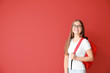 © Pixel-Shot - Cute teenage girl on color background