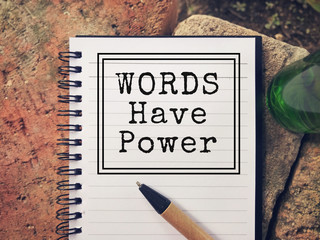 Wall Mural - Motivational and inspirational wording - Words Have Power written on a notepad.