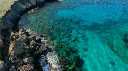 Wall Mural - Aerial view blue lagoon near Cape Cavo Greco on sunny day