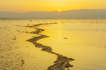 Wall Mural - Sunrise and salt formations in the Dead Sea