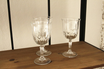 Pure alcohol glasses on wooden shelf