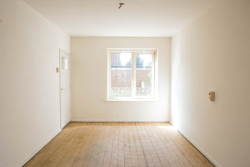 Wall Mural - empty white room with wooden parquet floor before renovation