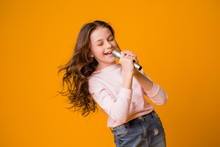 Baby Girl With Microphone Smiling Singing,Fat Girl Singing Song Into Microphone. Young Star, Looking For Talents.