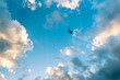 © Petros - airplane view from the ground looking up clear sky and clouds as background