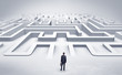 © ra2 studio - Businessman getting ready to enter a 3D flat labyrinth concept