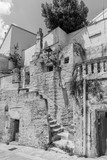 Fototapeta  - Massafra and its ravines. Houses built in the rock. Puglia in Black and White. Italy