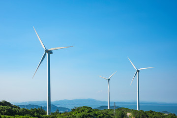 Wind turbines in the mountains near the sea