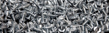 Sharp Screws As Abstract Background