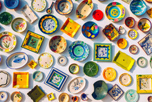 Collection Of Colorful Portuguese Ceramic Pottery, Local Craft Products From Portugal. Ceramic Plates Display In Portugal. Colorful Of Vintage Ceramic Plates In Sagres, Portugal.