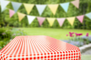 Wall Mural - Summer background of tablecloth and garden of summer time 