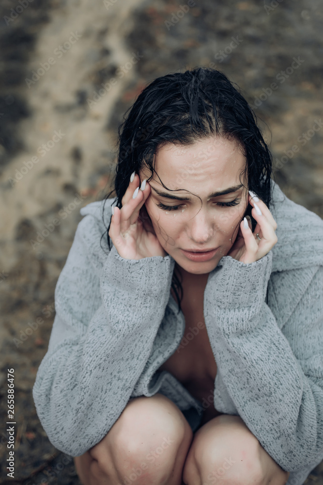 Love story. Sexy young wet woman. Crying depressed. Love. Passion