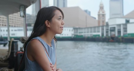 Poster - Woman take the ferry cross the harbor, in Hong Kong