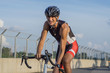 © Cavan Images - Male cyclist training for triathlon