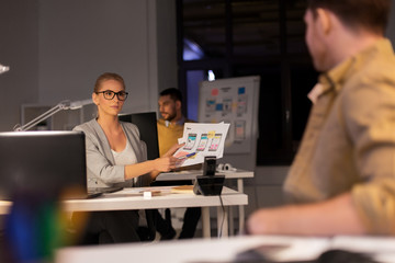 Wall Mural - business, deadline and technology concept - software developers discussing user interface design moc