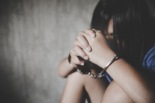 Child Hands In Handcuffs, Stop Violence Against Children, Human Trafficking Concept