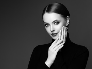 Wall Mural - beautiful young woman with clean fresh skin. perfect makeup. beauty fashion. plump lips. cosmetic ey