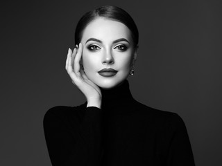 Wall Mural - beautiful young woman with clean fresh skin. perfect makeup. beauty fashion. plump lips. cosmetic ey