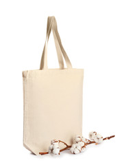 Wall Mural - Stylish eco bag and cotton flowers on white background