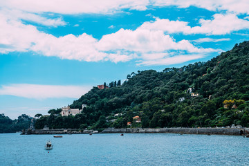 Morning view of Liguria landscape on coastline of mediterranean sea, Italy. View of the picturesque hill with luxury villas.