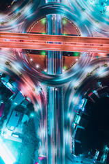 night city traffic on 4-way stop street intersection circle roundabout in Thailand.