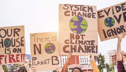 group of demonstrators on road, young people from different culture and race fight for climate chang