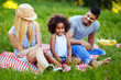 © NDABCREATIVITY - Picture of lovely couple with their daughter having picnic