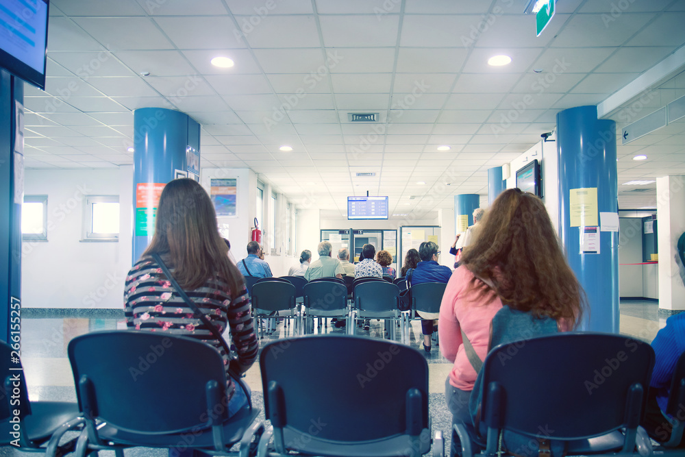 people in a waiting room of hospital, men and women wait their turn  - obrazy, fototapety, plakaty 