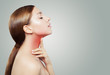 Young Woman with a Sore Throat. Woman Puts Hands on the Neck