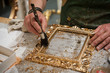  Master craftsman during the gilding process tecnique.