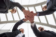 © Blanscape - business team gather hands in city