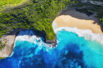 Wall Mural - Aerial view at sea and rocks. Turquoise water background from top view. Summer seascape from air. Summer adventure. Travel - image