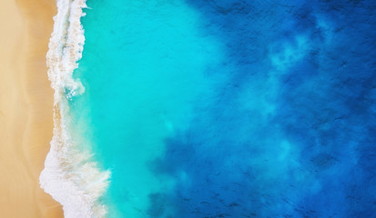 Wall Mural - coast as a background from top view. turquoise water background from top view. summer seascape from 