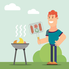 man cooks on the grill