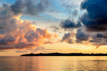 Wall Mural - Sunrise dramatic sky on sea, tropical desert beach, no people, stormy clouds, travel destination, Indonesia Banyak Islands Sumatra