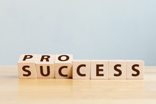 Process For Success Concept. Wooden Cube Block Flip Over Word Process To Success On Wood Table