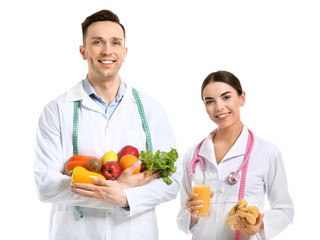 Portrait of nutritionists on white background