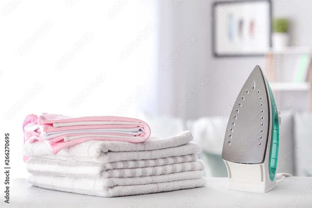 Iron and clean clothes on board