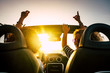 © simona - People joy and happy driving and traveling for summer holiday vacation and outdoor leisure activity with convertivle car laughing and dancing like crazy - sunlight in the glass and travel concept