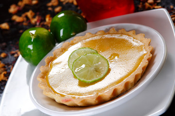 Lemon pie with puff pastry and blackberry.