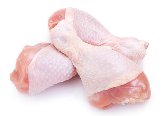 Sticker - Raw chicken legs on white background