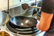 © SeanWonPhotography - washing a pan in the kitchen