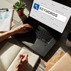 Wall Mural - Keywords. SEO, Search engine optimization and internet marketing concept on screen.