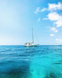 yacht in the blue sea in sunny day. Summer seascape. Yacht life concept. Sea vacation and travel concept. 