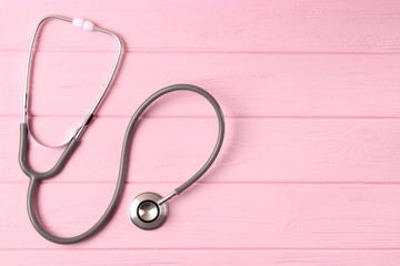 stethoscope on color background. Health, medicine