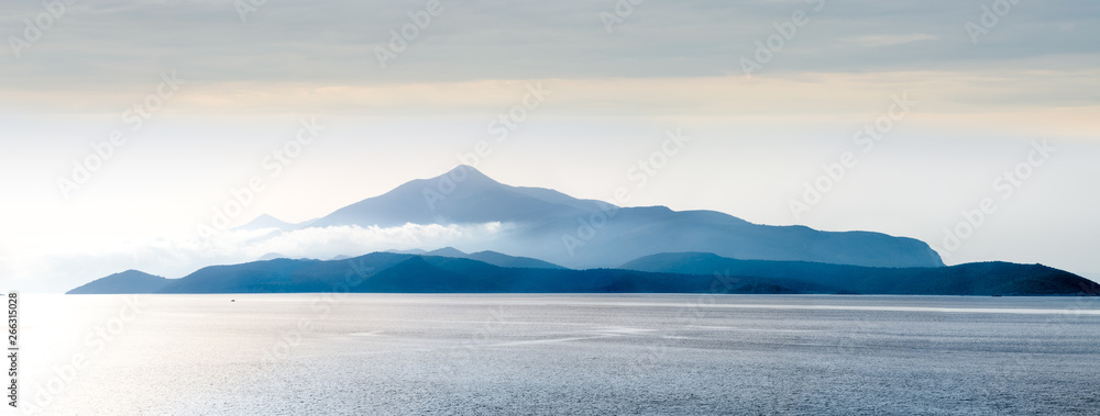 Mountain island in the sea panorama - obrazy, fototapety, plakaty 